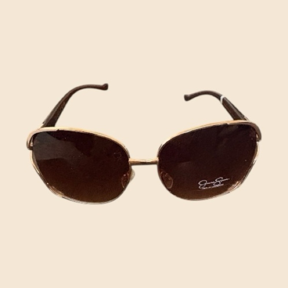 Jessica Simpson’s Elegant Light Brown Sunglasses with Gold trim new with tags.